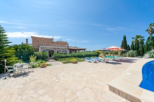 Pool area is surrounded by a terrace